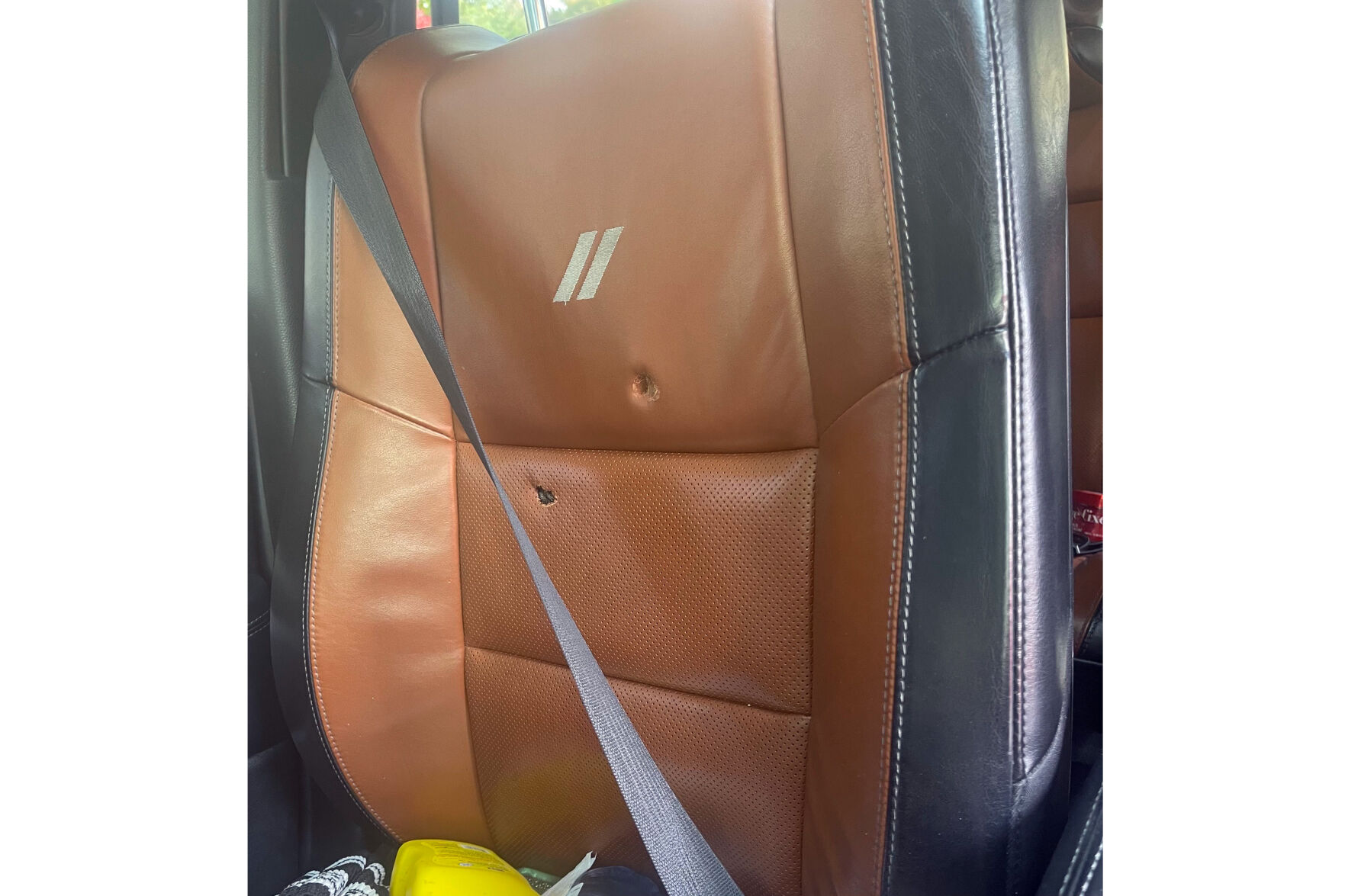 Police report omits a federal agent's shooting at a DC driver. The man's lawyers suspect a cover-up